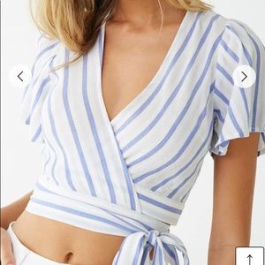White crop top with blue stripes